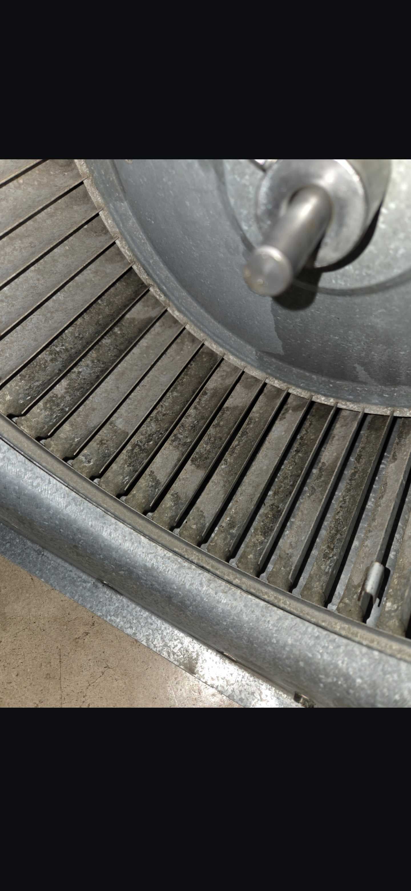 The blower wheel after cleaning, photographed from a different angle.