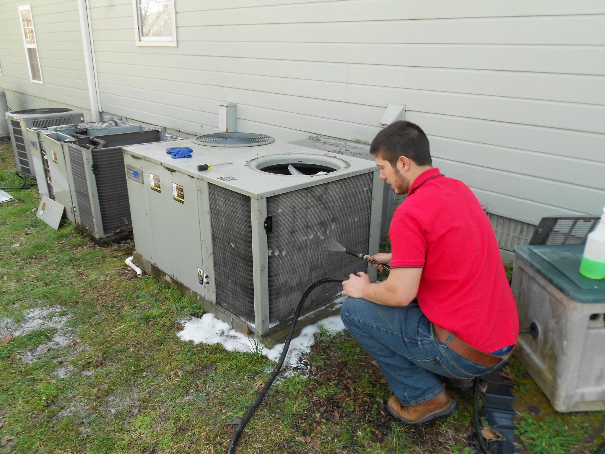 Seth Prince working on HVAC equipment
